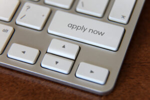 a photo of a keyboard with a custom "Find a Job Online" button