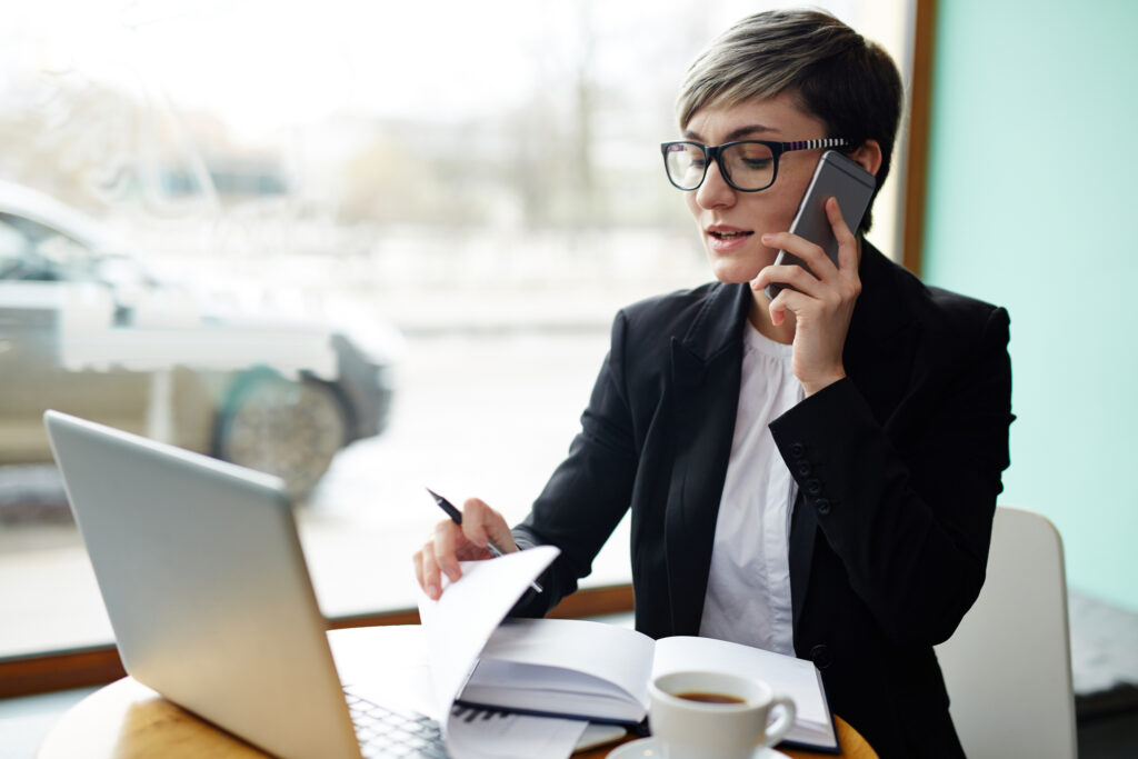 a woman broker busy on her phone